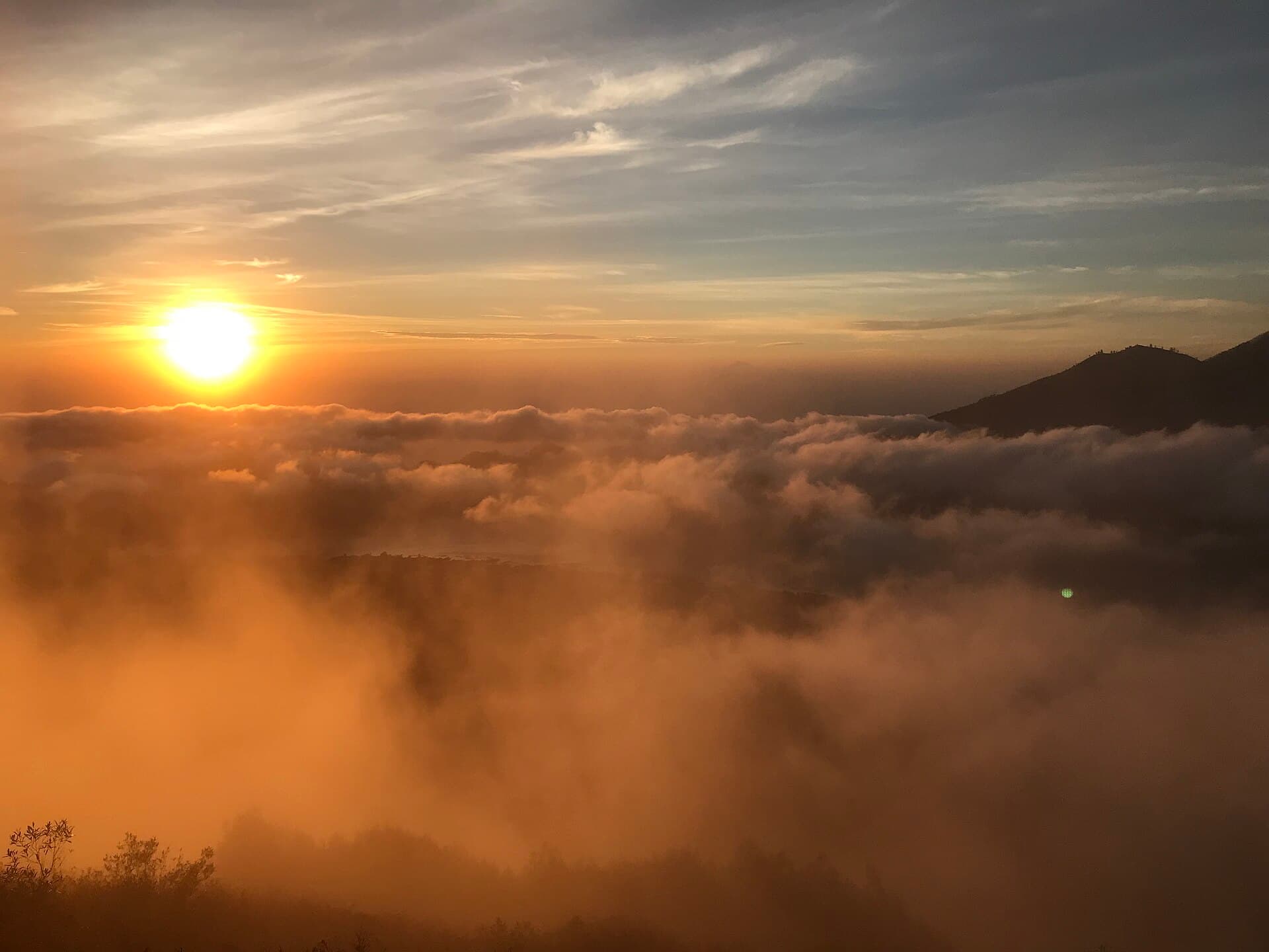 Sunrise over the clouds seen from Mount Batur